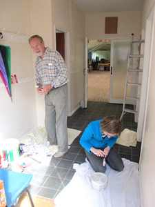 Laura and Jeff Keighley freshening up the foyer